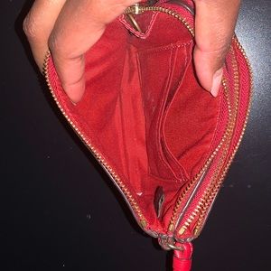 Leather Coach wristlet.